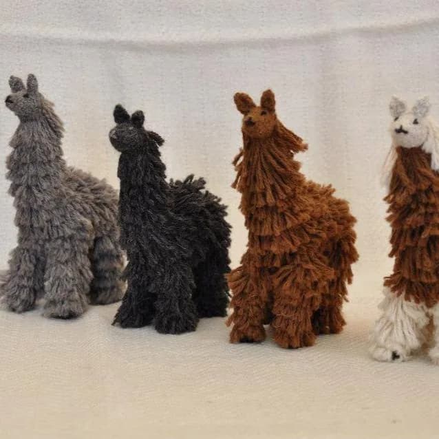 Hand-knitted thampulli llamas